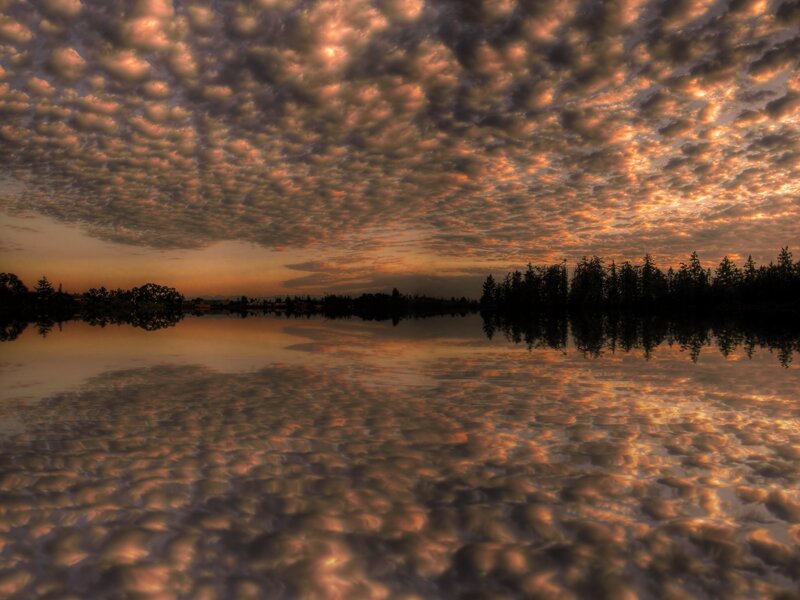 Clouds reflected in a lake at sunset