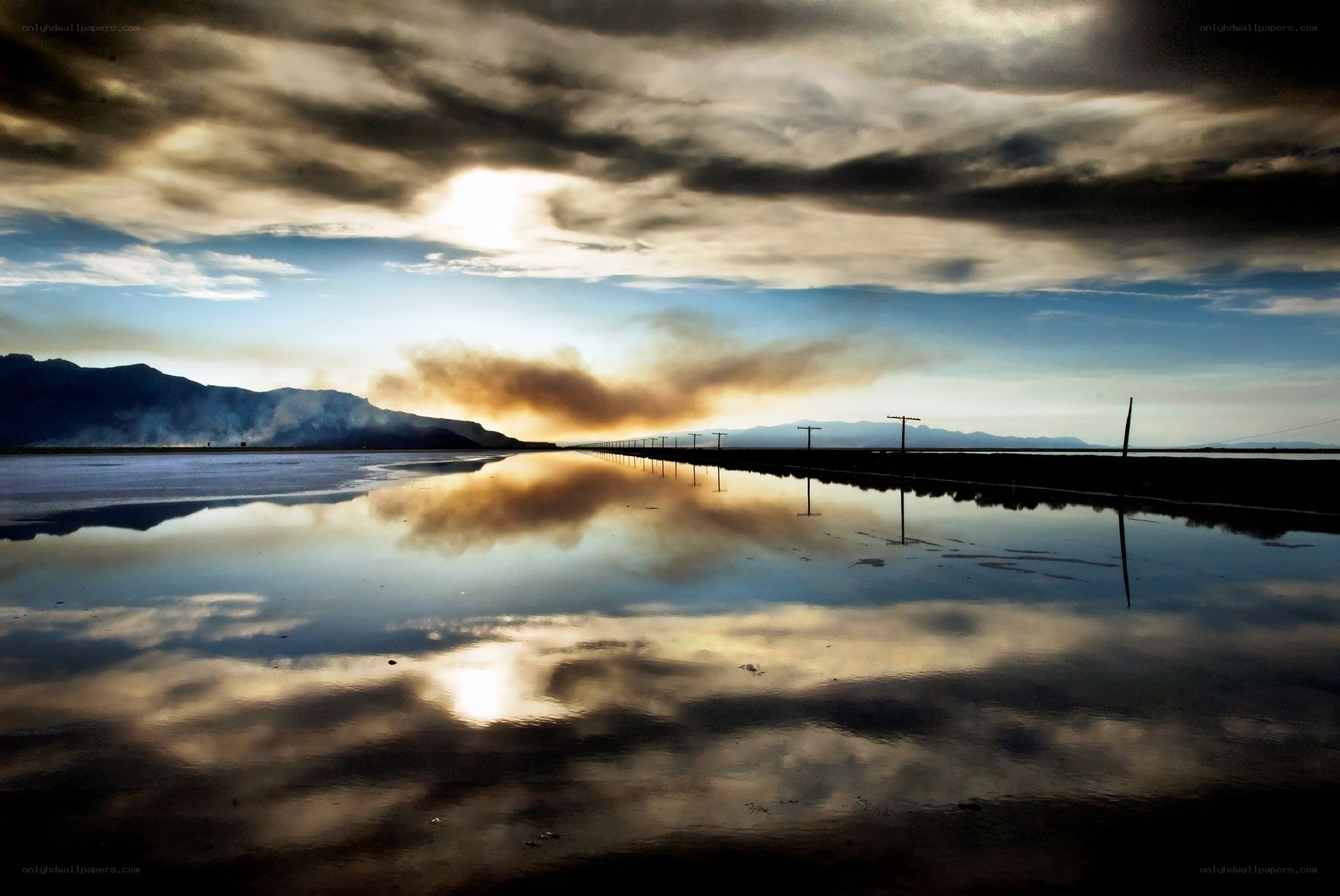 Clouds reflected in a salt flat