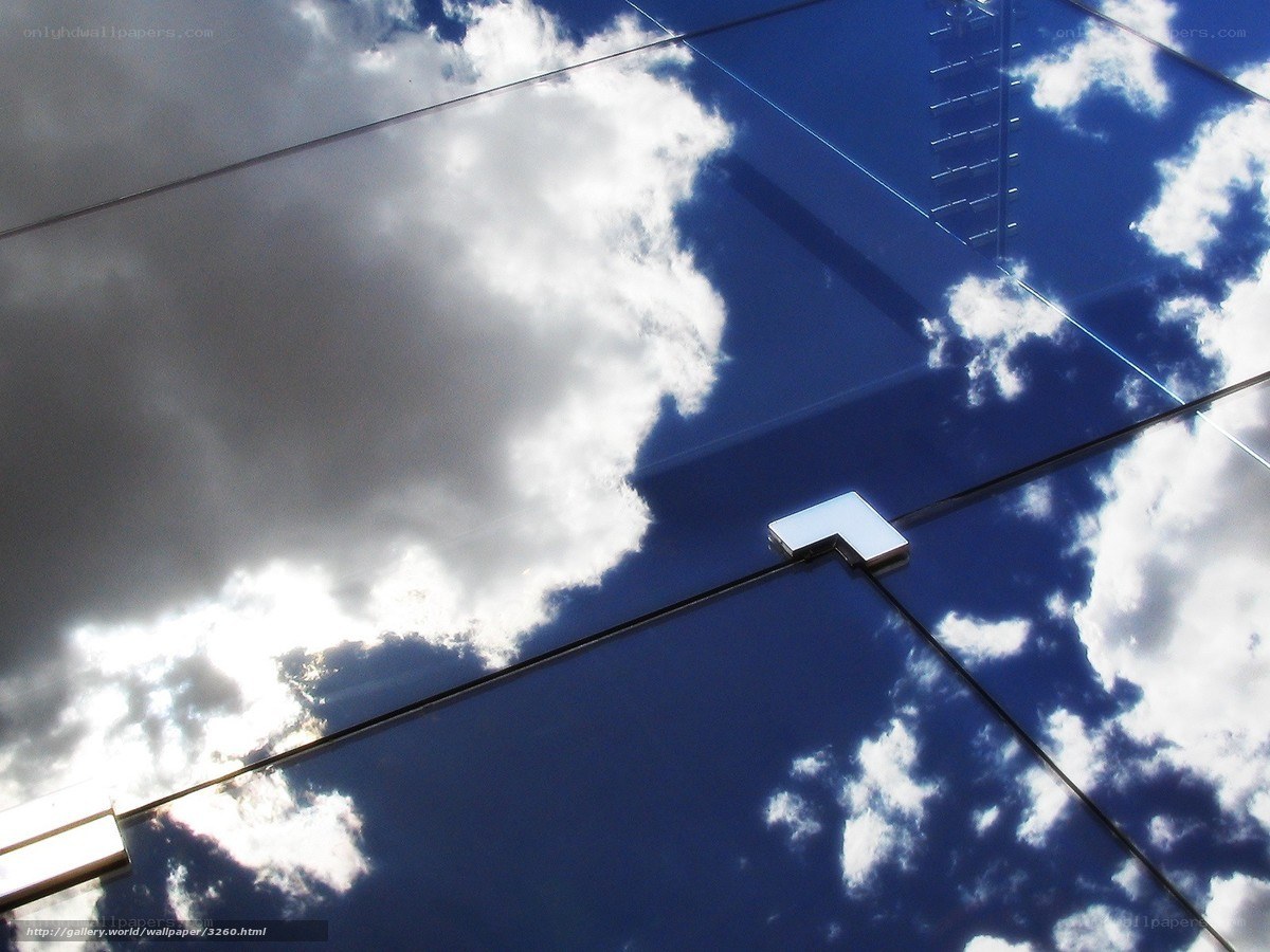 Clouds reflected in glass panels