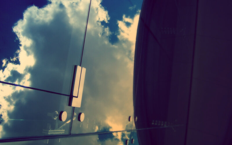 Clouds reflected in glass