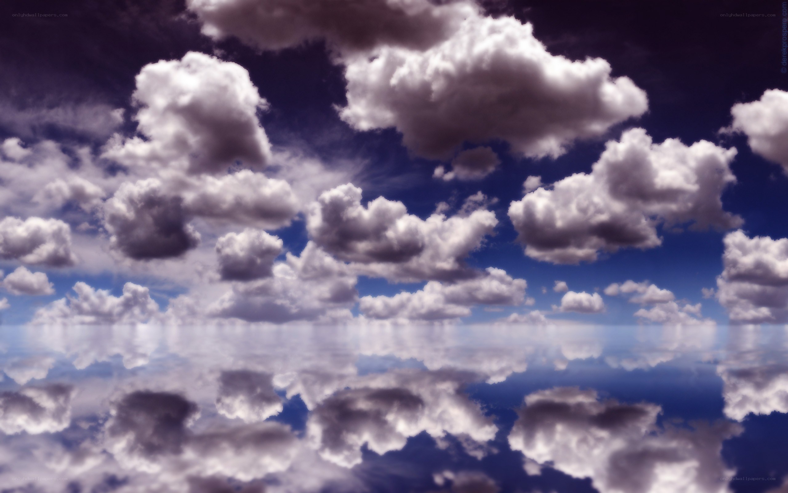 Clouds reflected in water
