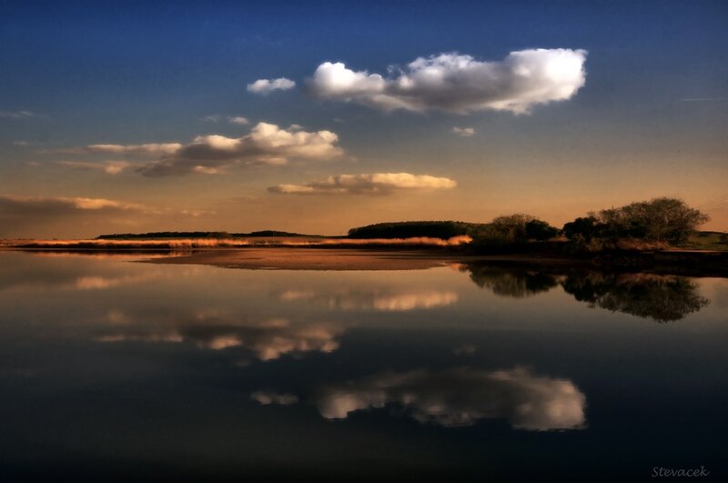 Clouds Reflecting in Water — Blue, Serene, Sunset, Photograph