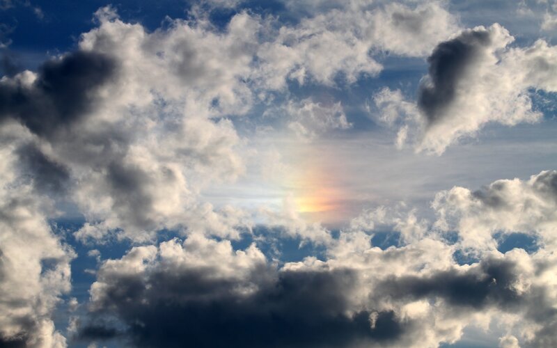 Clouds with Sun Halo — Blue, Dramatic