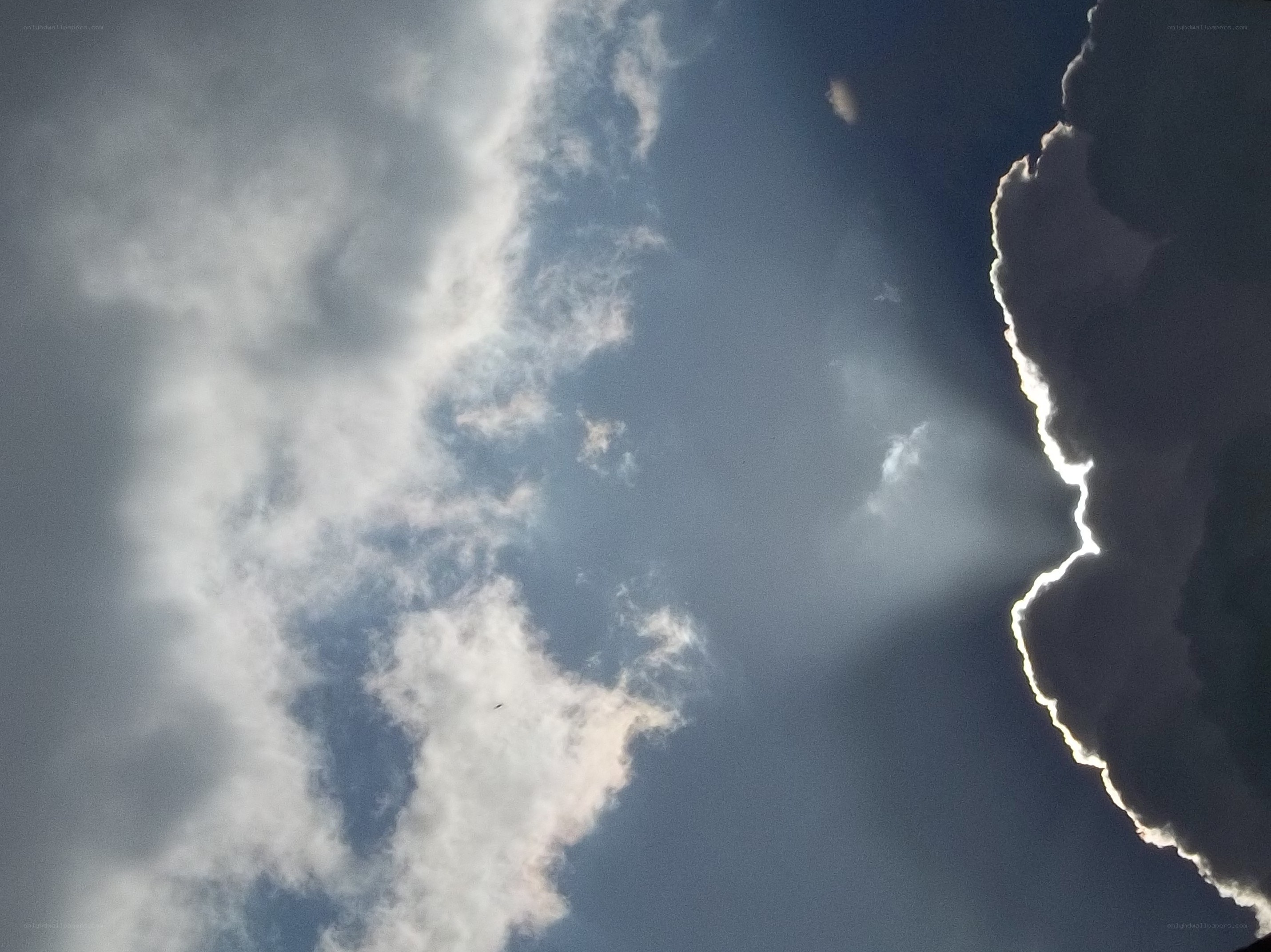 clouds with sunbeams