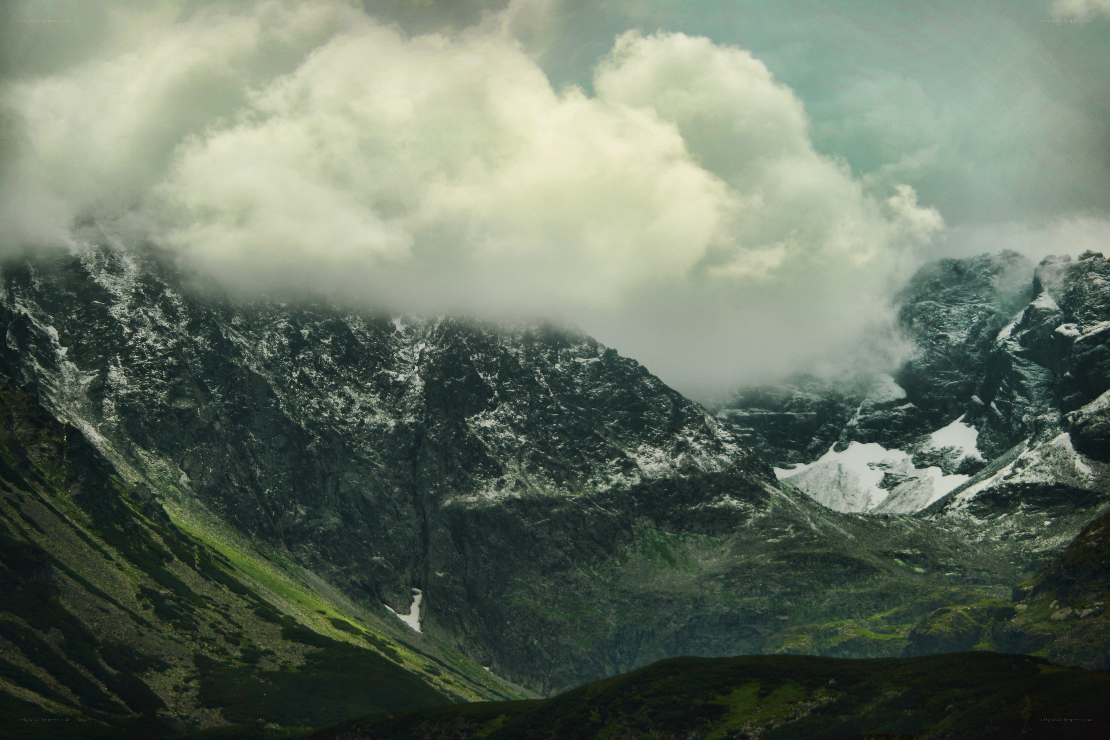 Cloudy mountain peaks