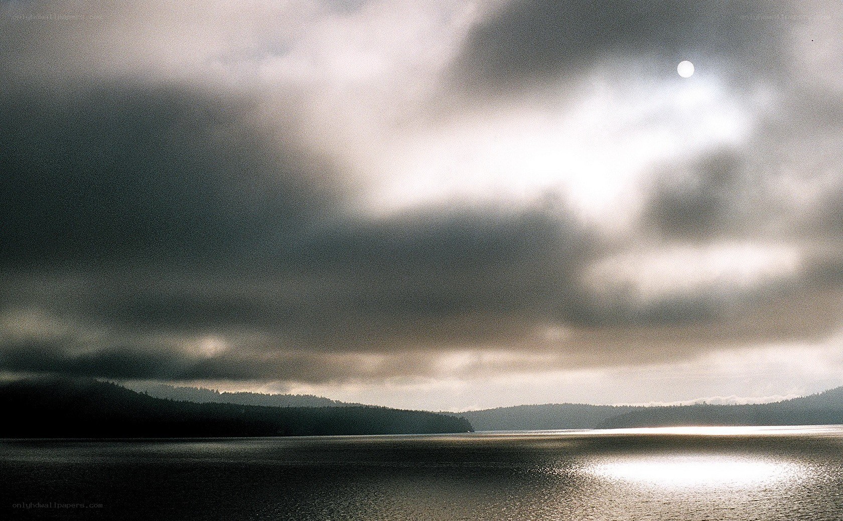 Cloudy sky over a calm lake