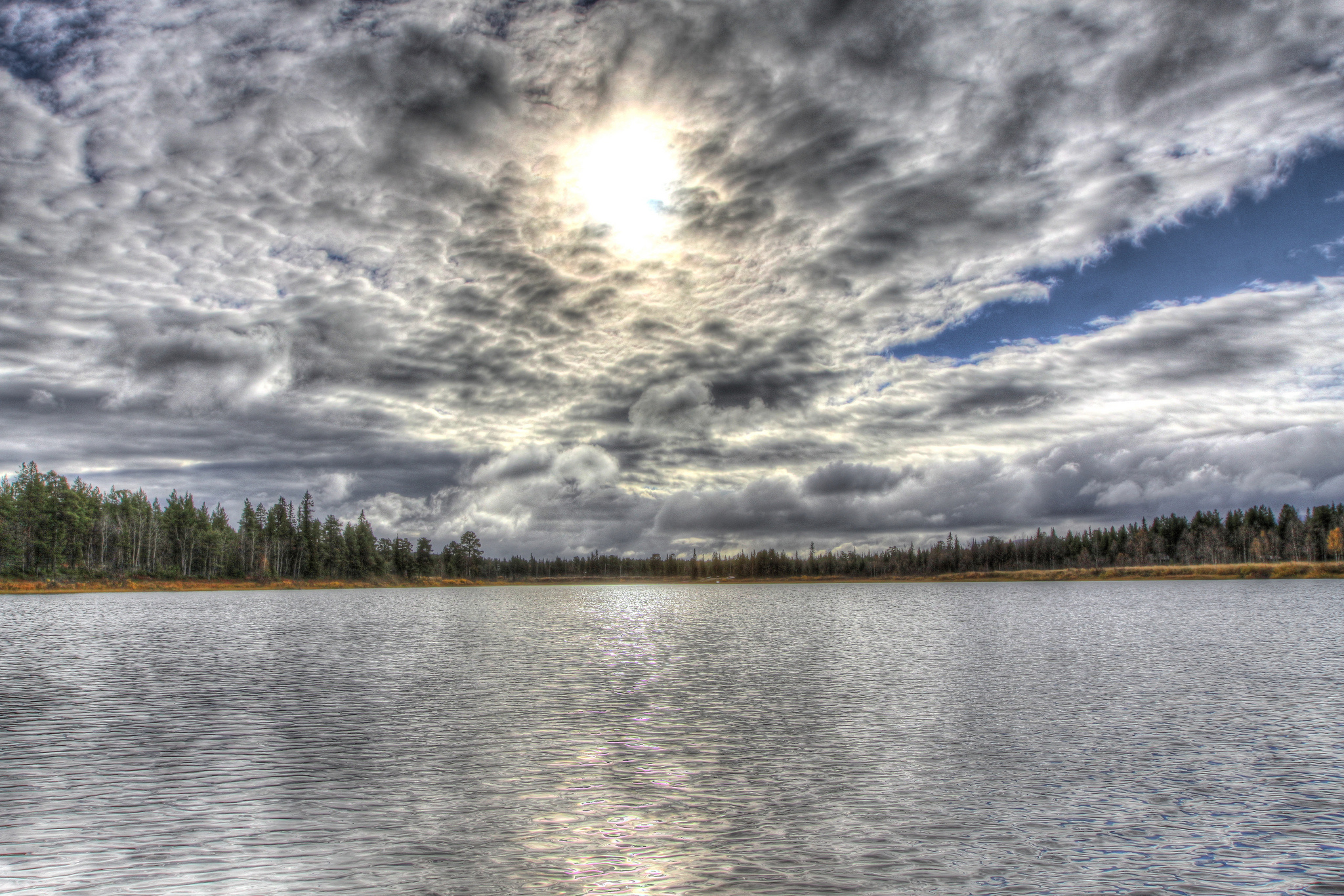 Cloudy sky over a calm lake