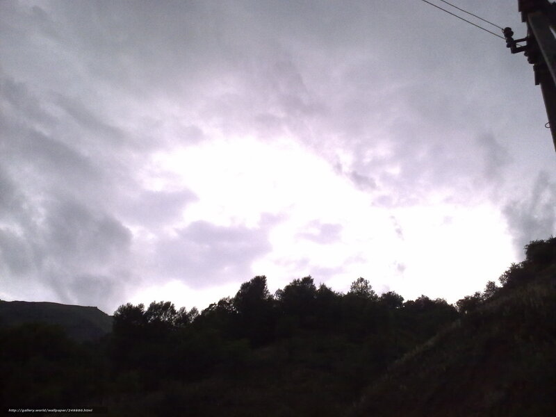 Cloudy sky over hills
