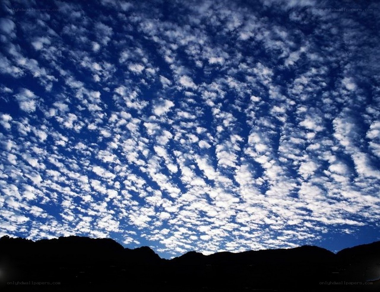 Cloudy sky over mountains