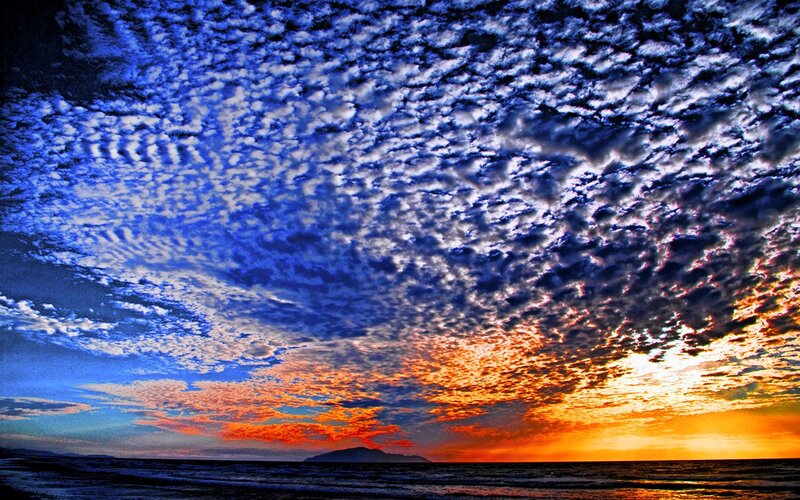 Cloudy Sky over Ocean — Blue, Dramatic, Sunset