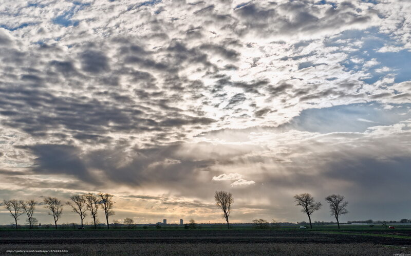Cloudy sky over rural landscape