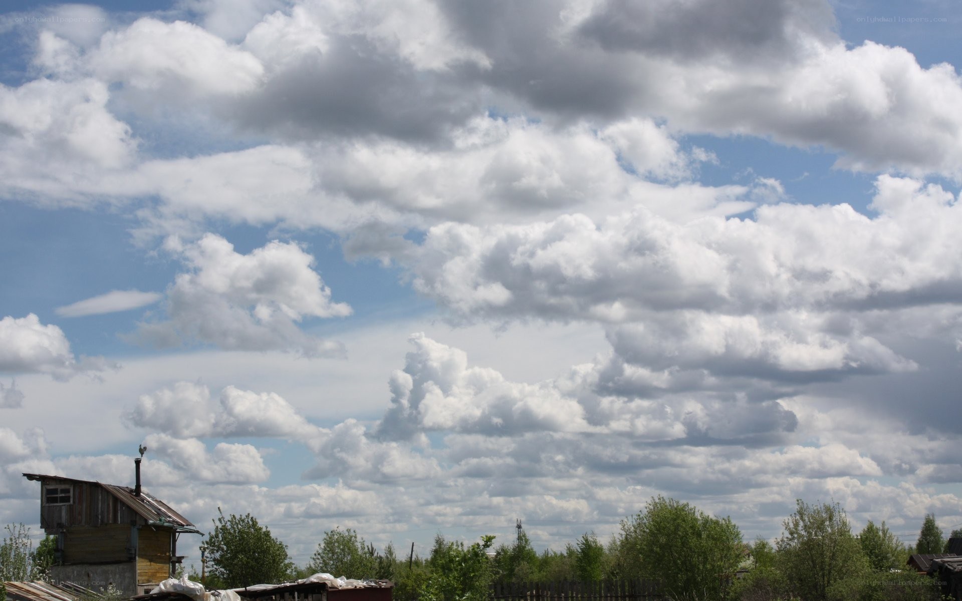 Cloudy sky over rural village