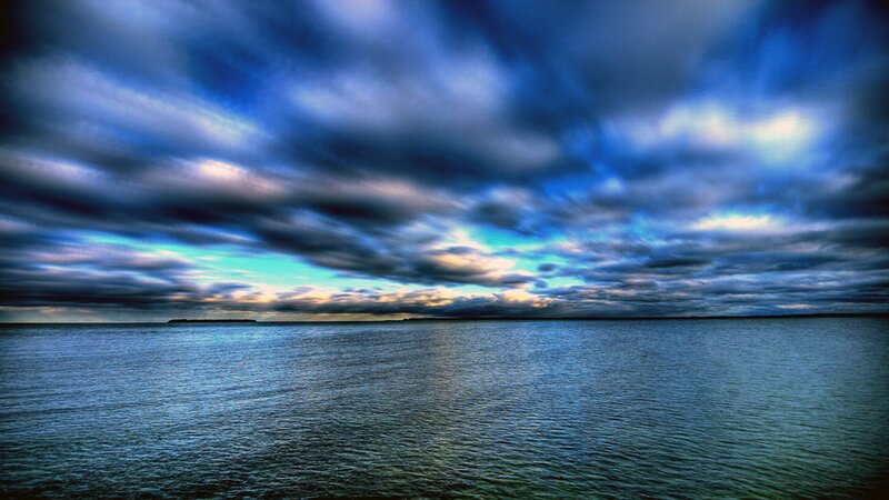 Cloudy Sky over Water — Blue, Dramatic, Sunset