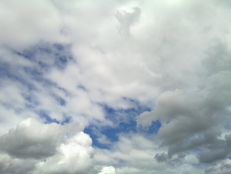 cloudy sky with blue patches