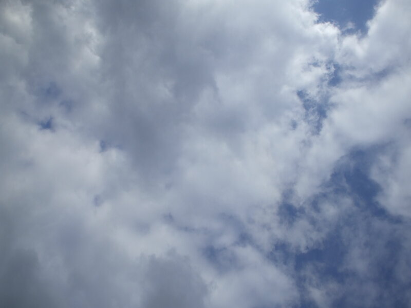 cloudy sky with blue patches