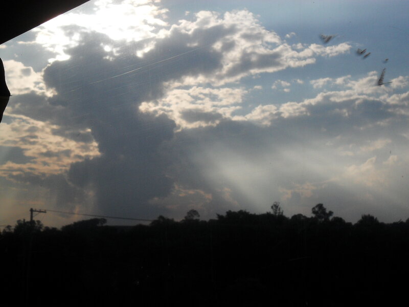 Cloudy Sky with Sunbeams — Blue