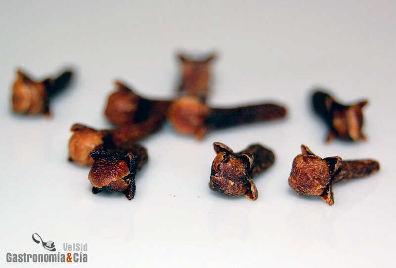 cloves on a white surface