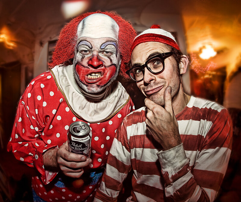 Clown and Man in Striped Shirt
