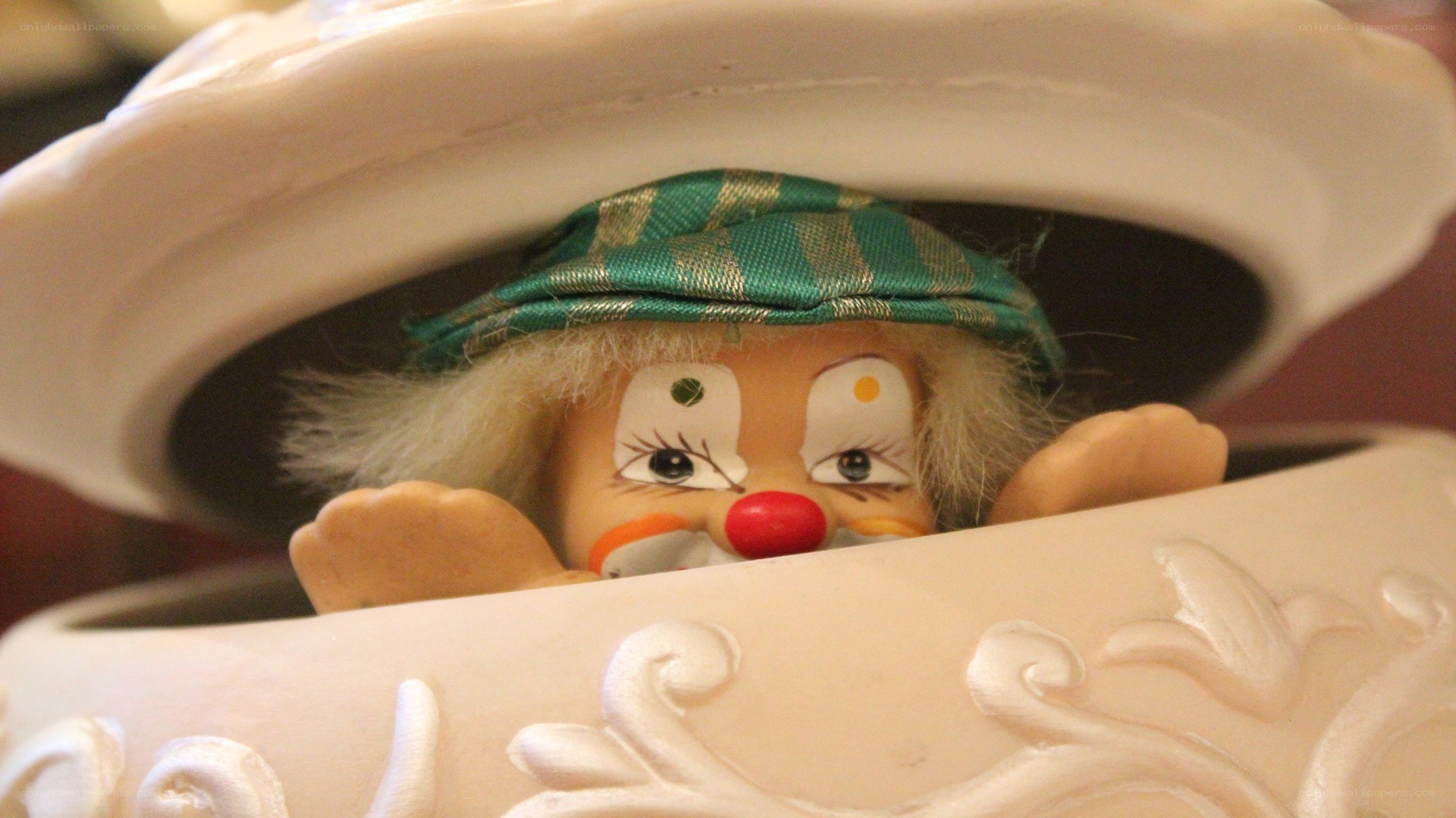 clown doll in a container
