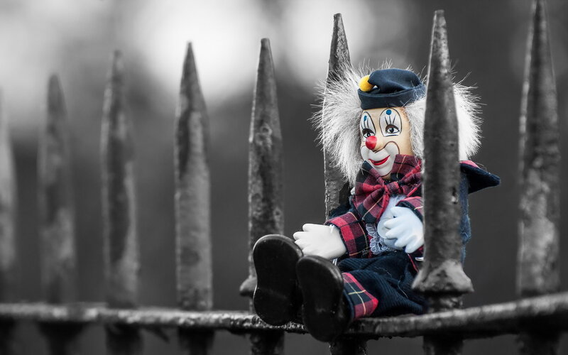 Clown Doll on Fence — Black