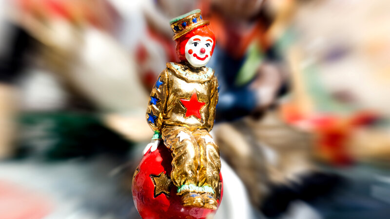 Clown Figurine on Red Ball