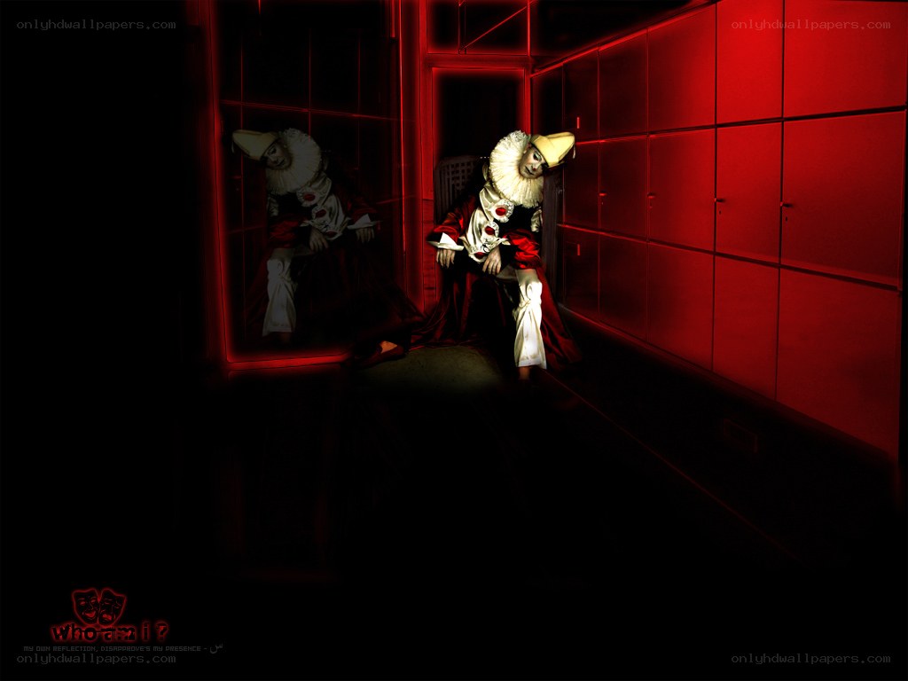 clown in a red-lit hallway