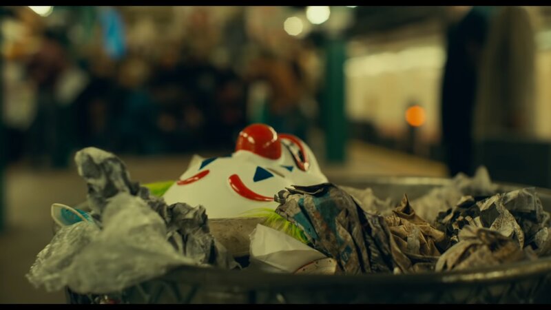 Clown Mask in Trash
