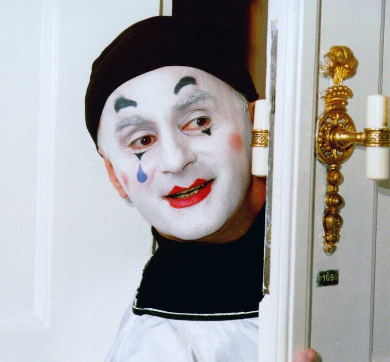 clown peeking from door