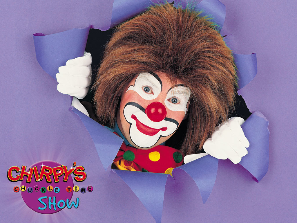 Clown peeking through paper