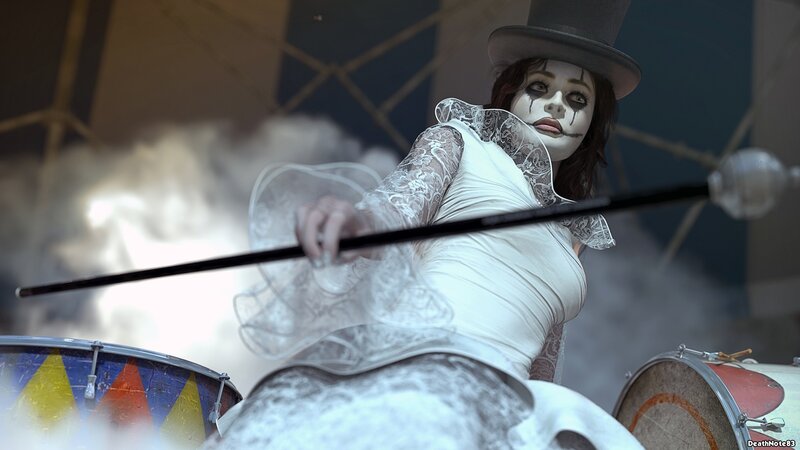 clown performer with drumsticks