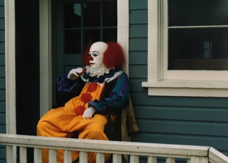 Clown Sitting on Porch