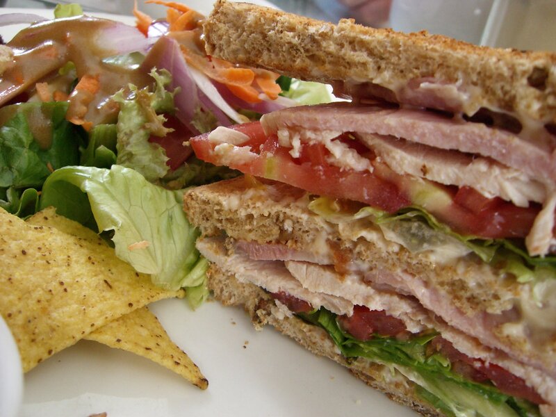 club sandwich with salad and chips
