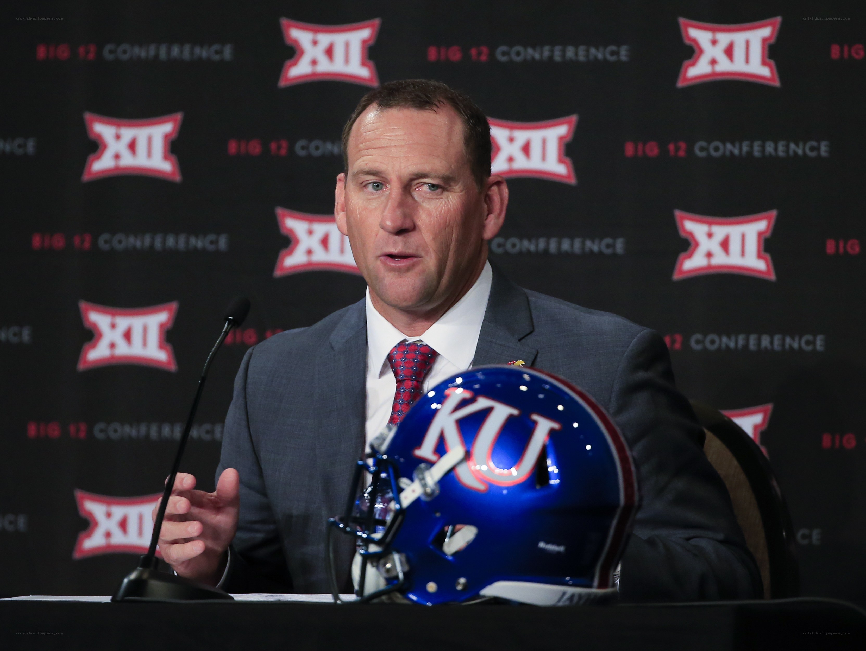 Coach at press conference
