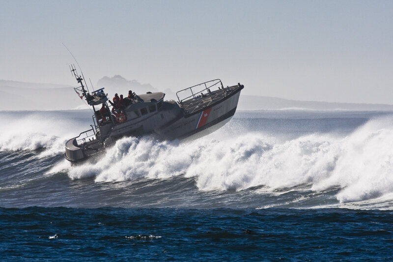 Coast Guard boat navigating rough waves