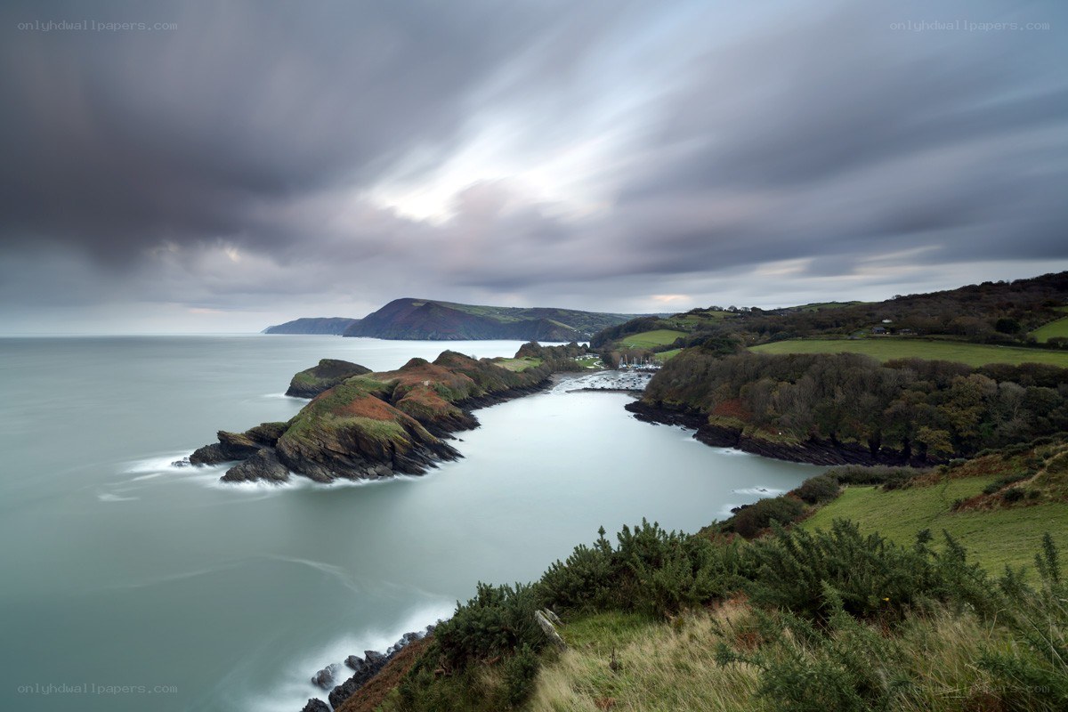 coastal bay under stormy sky