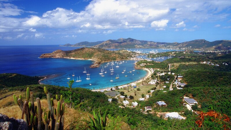 coastal bay with boats and hills