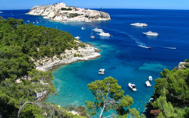 Coastal bay with boats and island