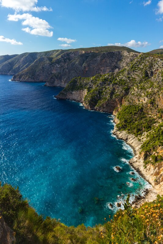 Coastal Bay with Cliffs — Blue, Serene, Afternoon, Photograph, Sea, Sky