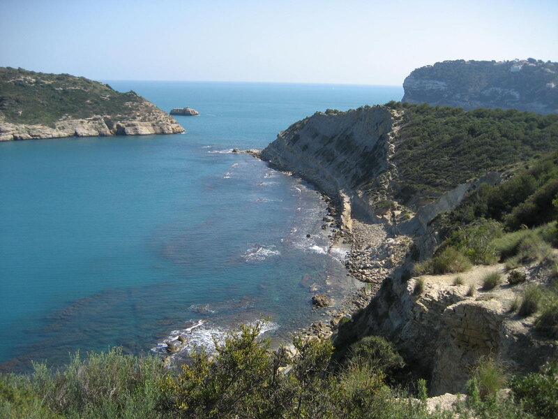 Coastal Bay with Cliffs — Blue, Serene, Afternoon, Photograph, Sea