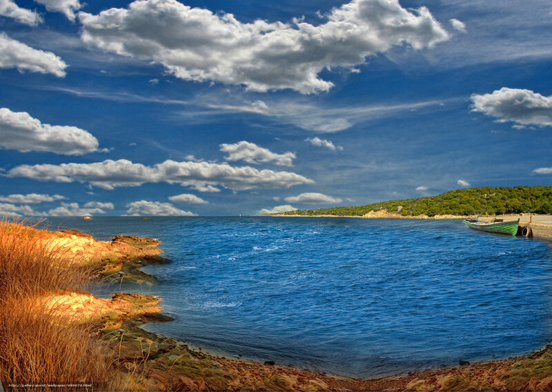 Coastal Bay with Green Boat