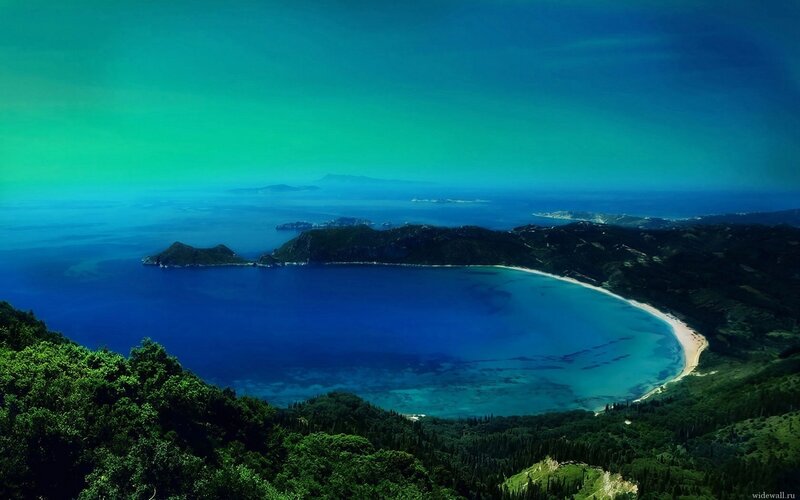 Coastal bay with green hills