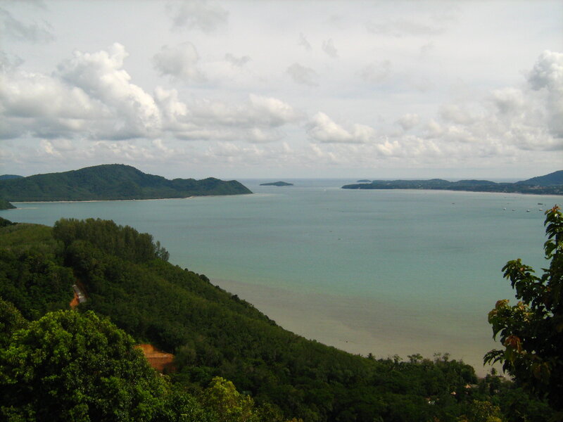coastal bay with green hills