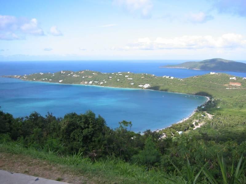 coastal bay with green hills