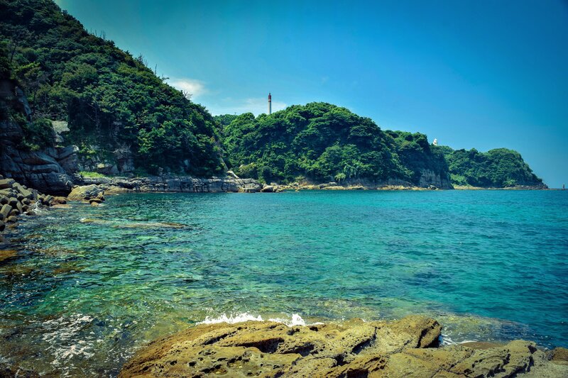 Coastal Bay with Lighthouse — Blue
