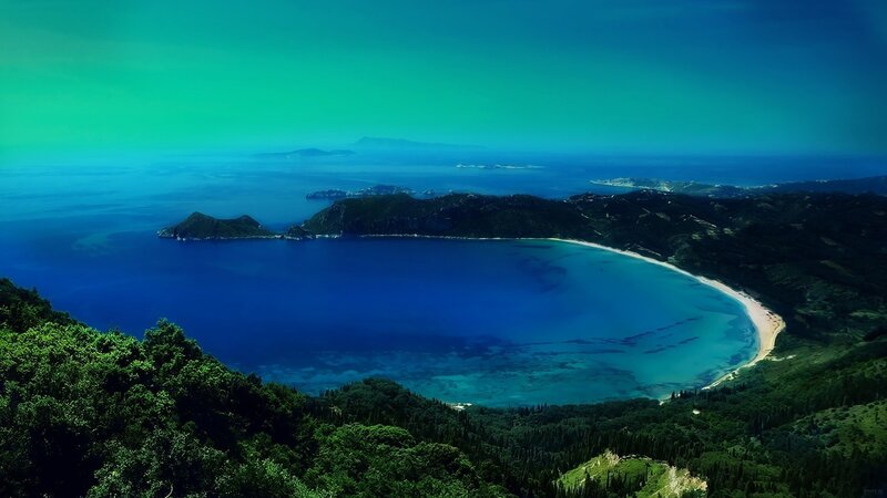 Coastal bay with lush green hills