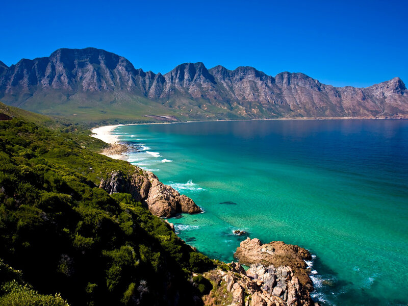 Coastal Bay with Mountains — Blue, Serene, Afternoon, Photograph, Beach, Ocean, Cliffs