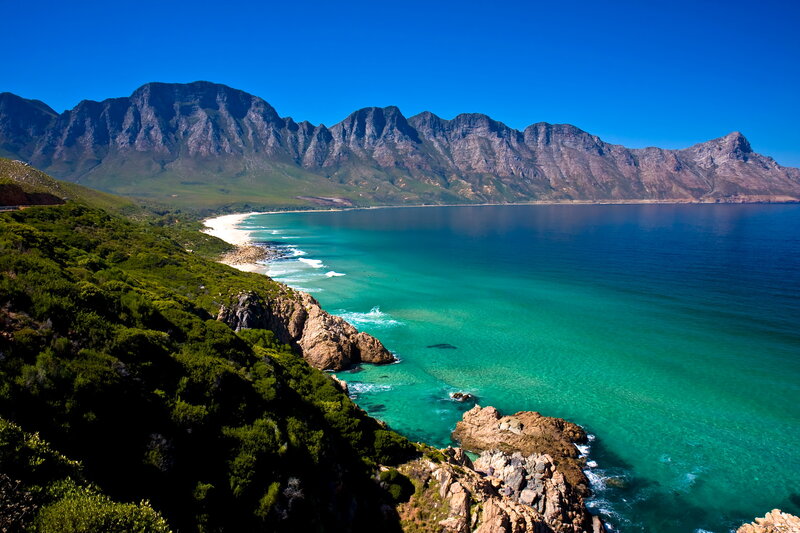 Coastal Bay with Mountains — Blue, Serene, Afternoon, Photograph, Beach, Ocean, Vegetation