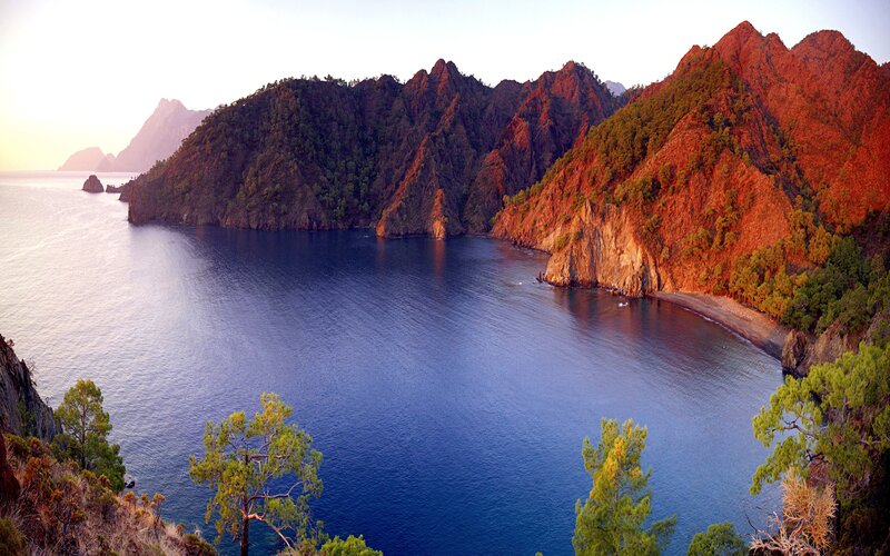 Coastal Bay with Mountains — Blue, Serene, Sunset