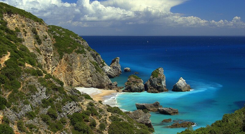 Coastal Bay with Rocks — Blue, Serene, Afternoon, Photograph, Cliffs, Beach, Sea