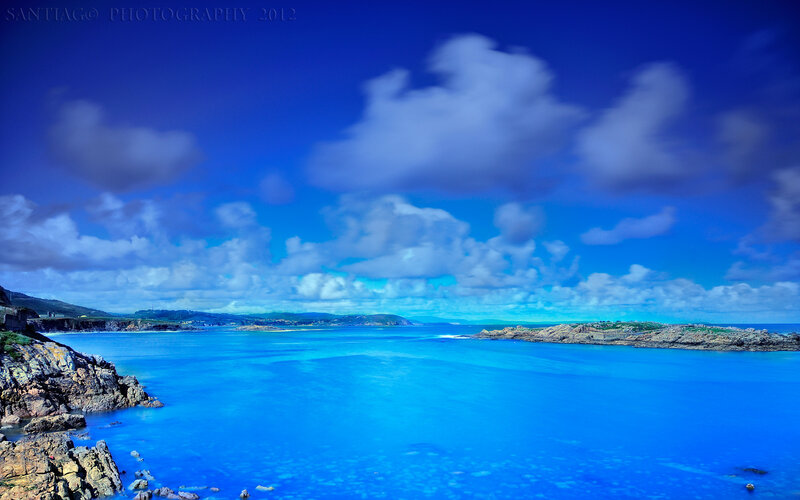 Coastal Bay with Rocks — Blue, Serene, Afternoon, Photograph, Sea, Clouds